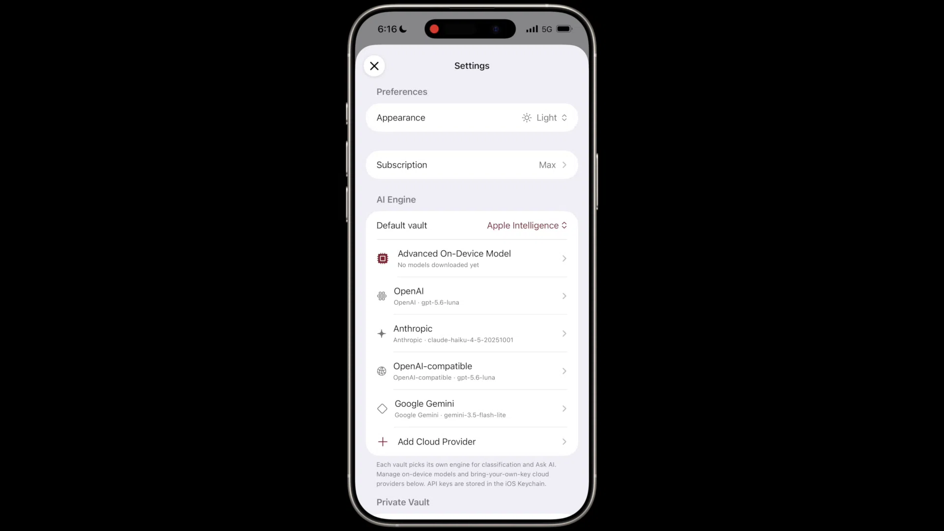 Cella downloading an advanced on-device model and selecting it for the Default vault.